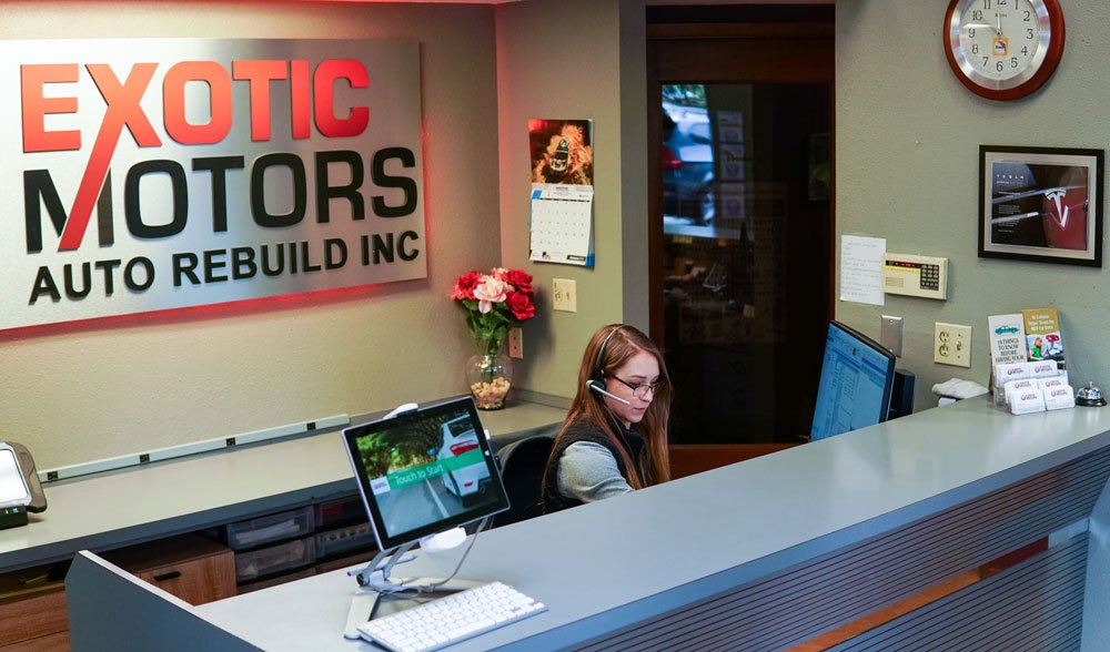 Front desk customer service at Exotic Motors.