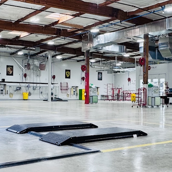 New expansion building for Exotic Motors, now open for collision damage repair services.